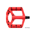 The HT Components Supreme C PA32A Pedals are neon orange flat pedals made from nylon reinforced composite, featuring black replaceable grip pins and axle—offering durability and strong grip, shown from the top against a white background.