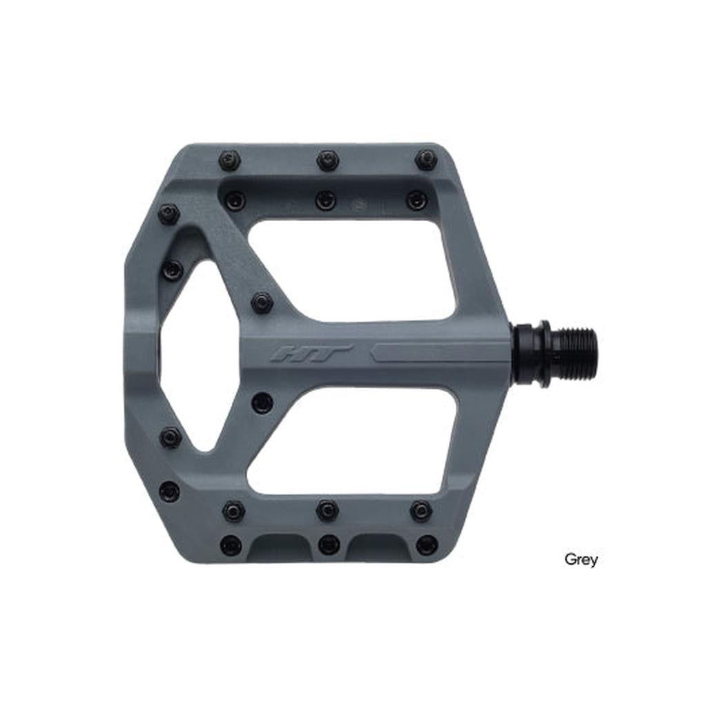 The HT Components Supreme C PA32A Pedals are grey flat pedals with replaceable grip pins and a central spindle, providing excellent traction for a grippy ride.