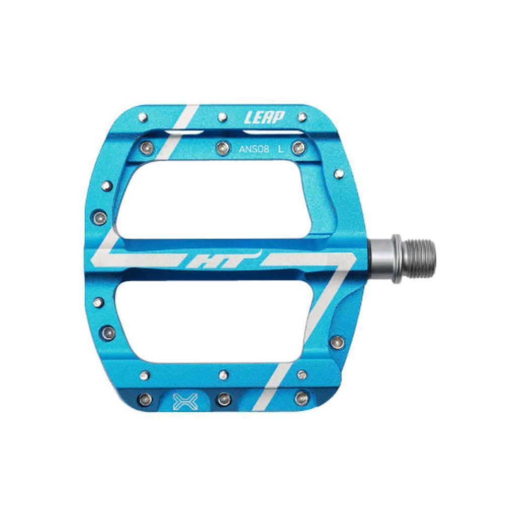 The HT Components Leap ANS08 Pedals feature blue and silver flat platforms with metal pins, "LEAP" and "ANS08 L" labeling, silver spindles, and the EVO+ bearing system for smooth, high-performance mountain bike rides.