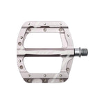 The HT Components Leap ANS08 Pedals are flat, silver aluminum pedals with multiple grip pins and a threaded spindle, perfect for mountain bike use.