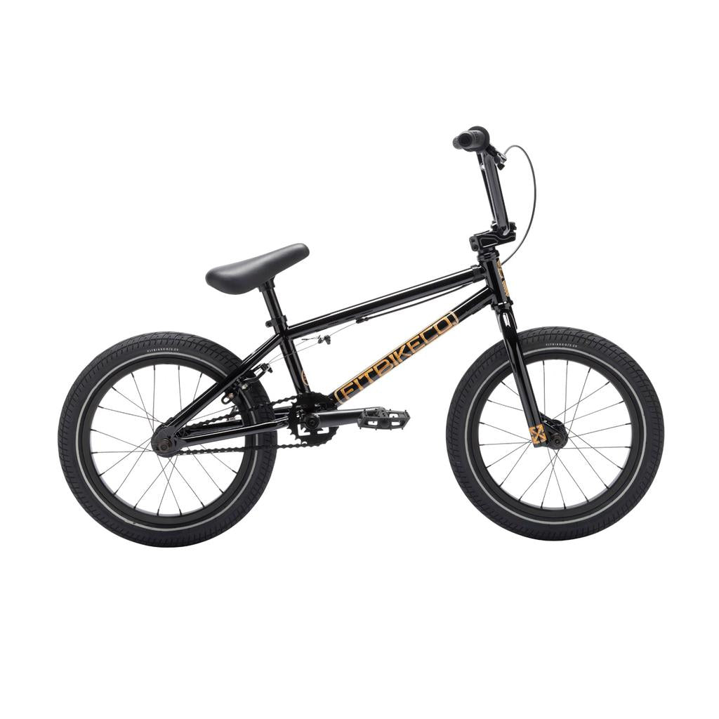 The Fit Bike Co Misfit 16 is a black kids BMX bike with a compact frame, 16-inch wheels, and a single gear, shown from the side on a white background.