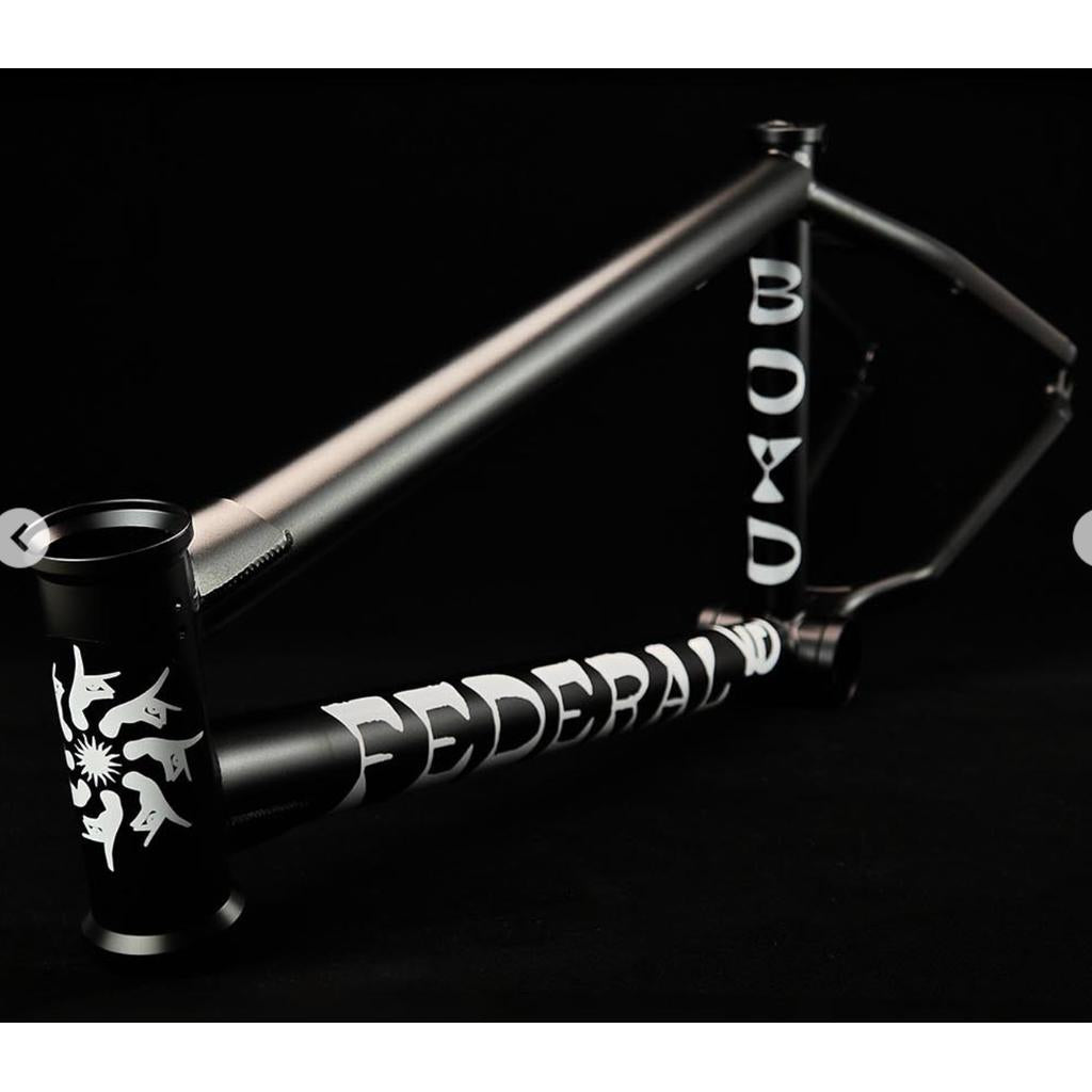 The Federal Boyd V2 Frame (Boyd Hilder Signature) is a matte black BMX frame with a taller standover and features "FEDERAL" white graphics on the downtube and head tube, shown against a black background.