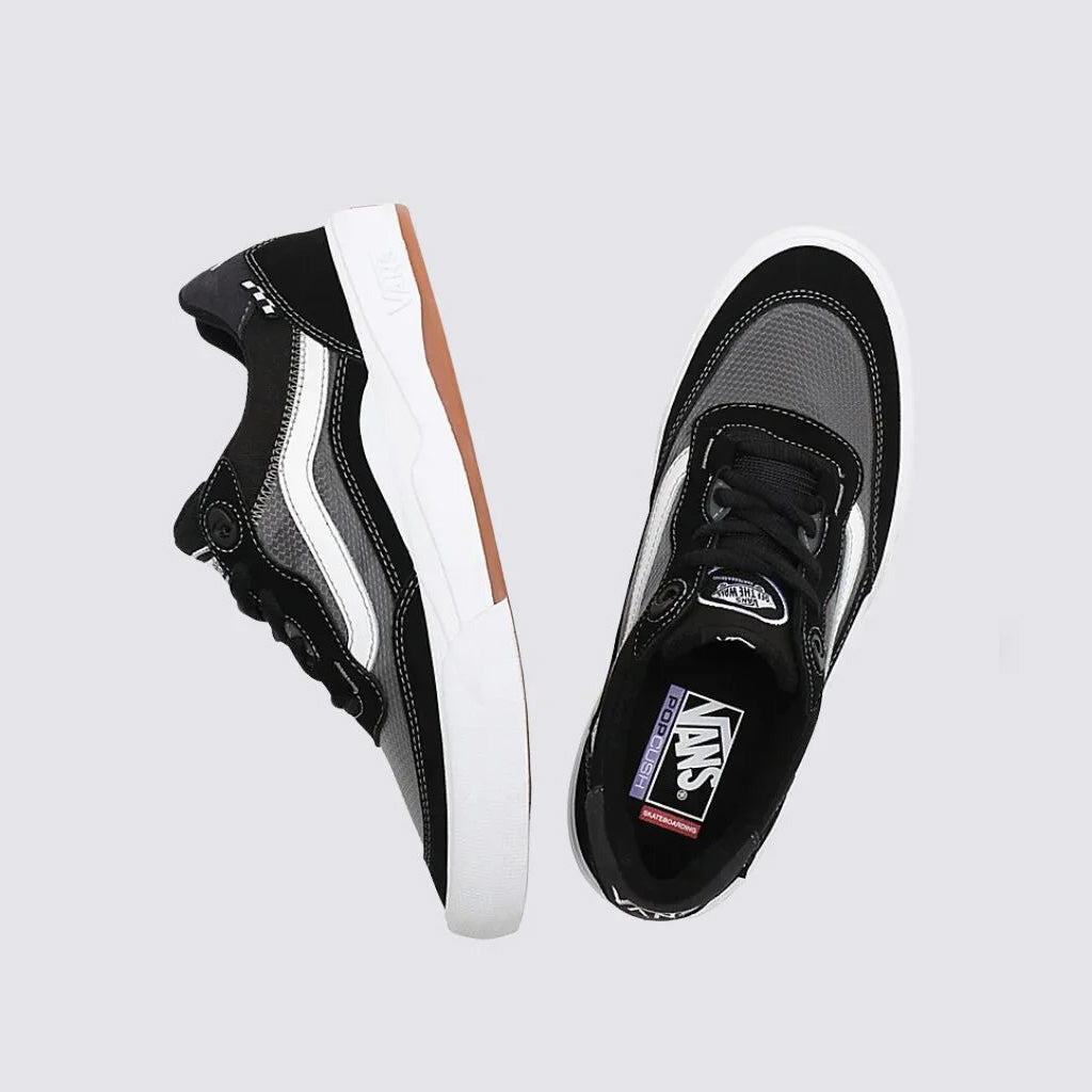 A pair of black and white Vans Wayvee Pro Shoes displayed against a grey background, one showing the side profile and the other the top view.