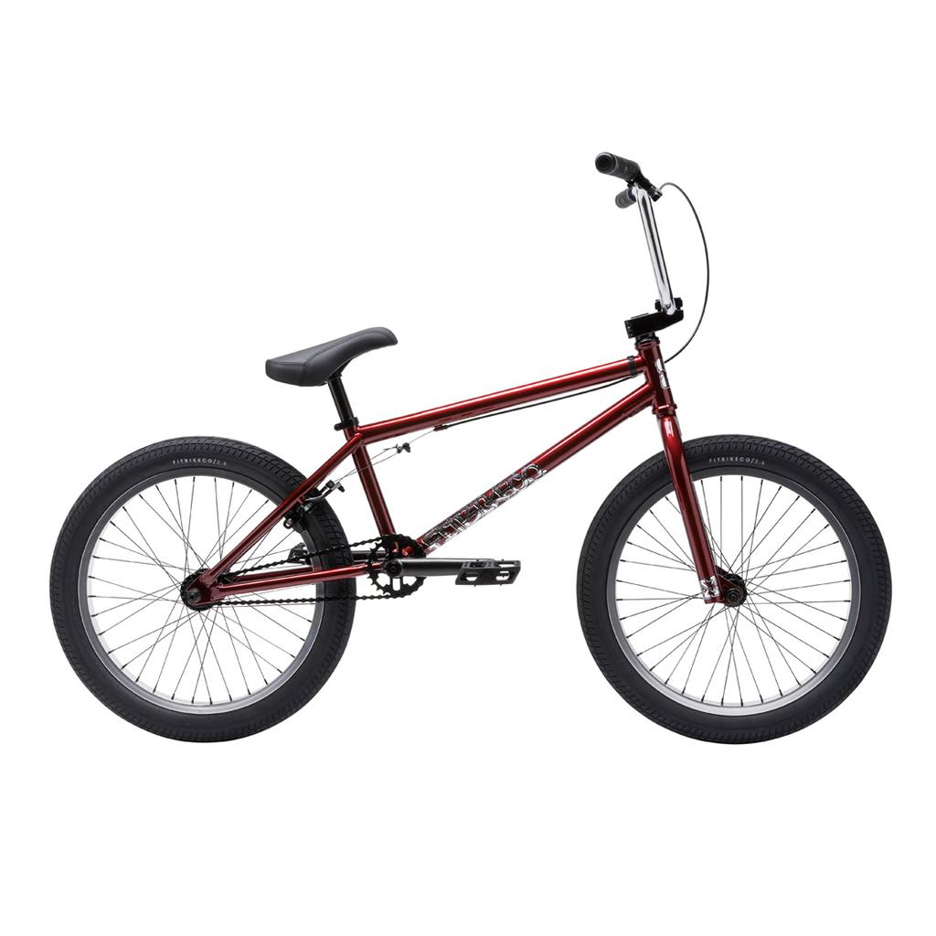 Fit Bike Co Series One Bike in red, featuring a Cro-Mo frame, black seat, black handlebars, and thick black tires, displayed side-on against a white background.