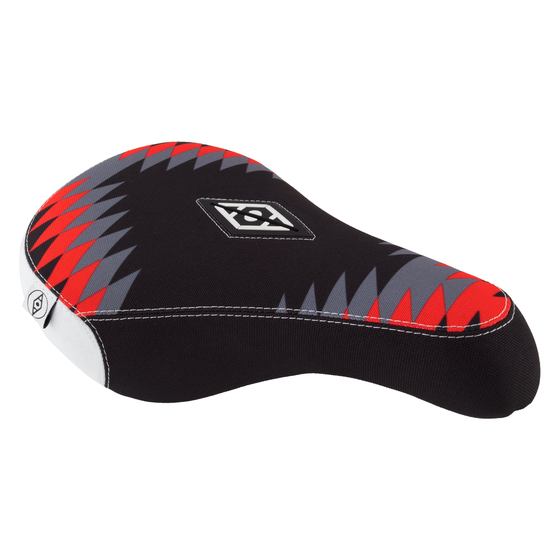 The Alienation Thunderbird Pivotal Seat is black with a geometric red, gray, and white Southwest-inspired pattern and a small white center logo.
