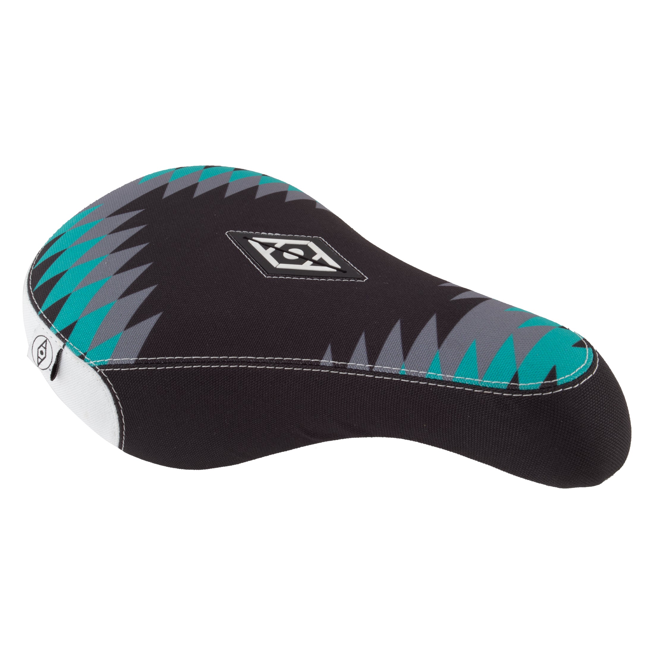 The Alienation Thunderbird Pivotal Seat is black with a teal and gray Southwest-inspired zigzag pattern and features a small diamond logo in the center.