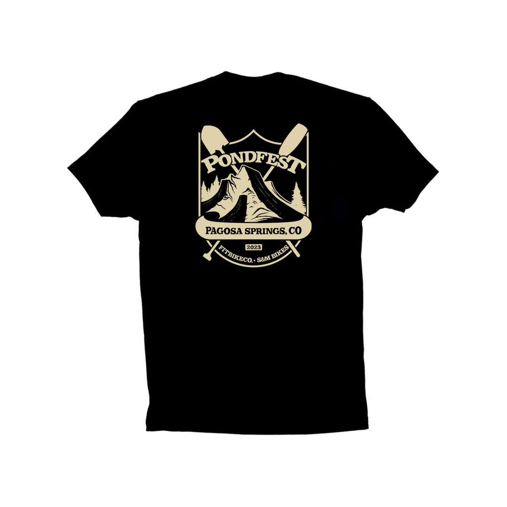 The S&M Pondfest Shield T-Shirt features a black logo with a "PondFest" design—mountains, trees, paddles, and text "Pagosa Springs, CO 2023" and "Riverbend - San Juan," proudly printed in the USA.