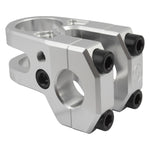 The Alienation Iron Maiden Stem 42mm is a pair of CNC-machined silver 7075-T6 BMX stems with black bolts, angular edges, and cylindrical openings for handlebar and fork attachment.