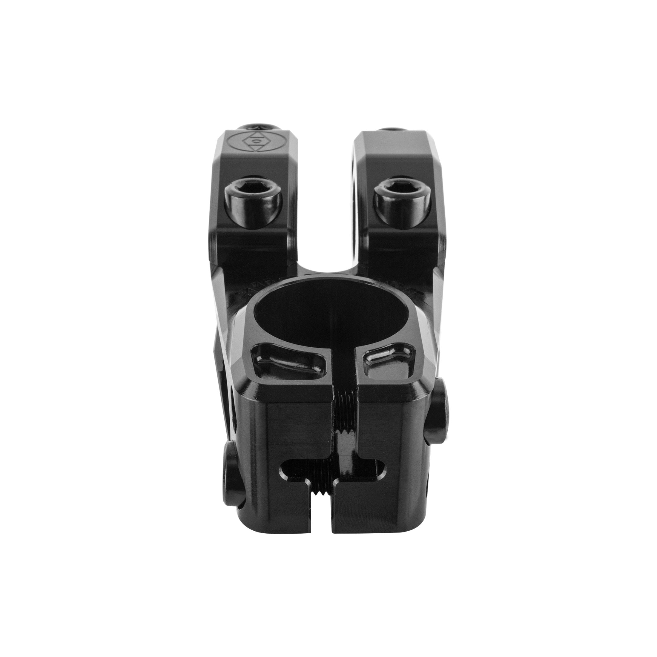 The Alienation Vault Stem is shown from the front, highlighting its black metal finish, clamp area, and four bolt holes for securing BMX handlebars.