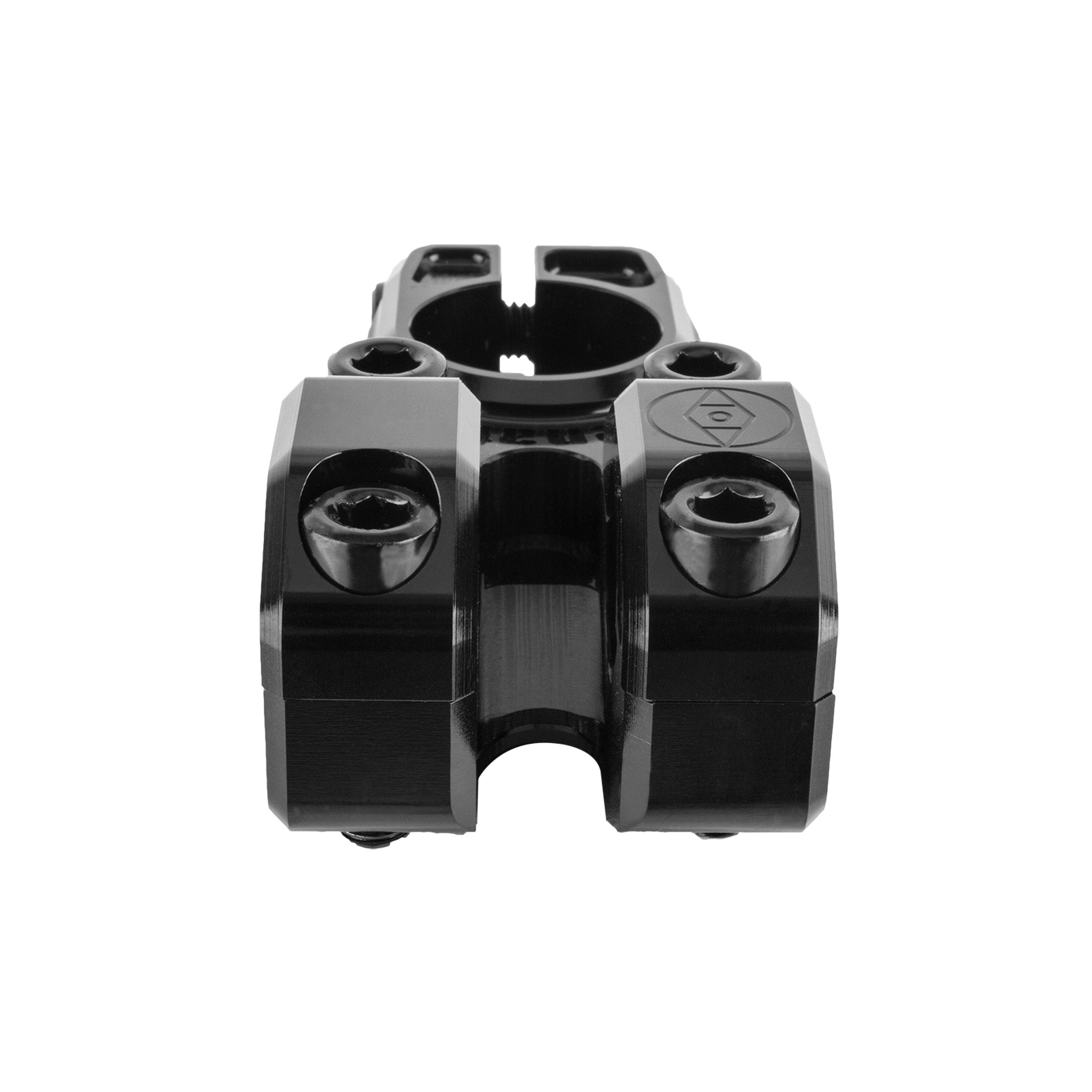 The Alienation Vault Stem, shown from the front with four mounting bolts and a central clamp opening, is isolated on a white background.