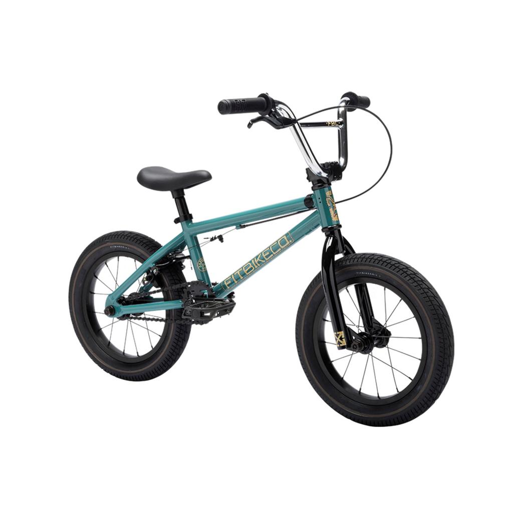 The Fit Bike Co Misfit 14 Inch Bike is shown on a plain white background, featuring a teal and black frame, thick tires, a straight seat, and upright handlebars.