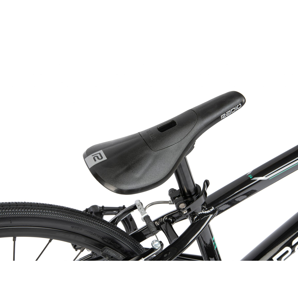 A black Radio Xenon Expert BMX race bike with a seat and handlebars on a white background.