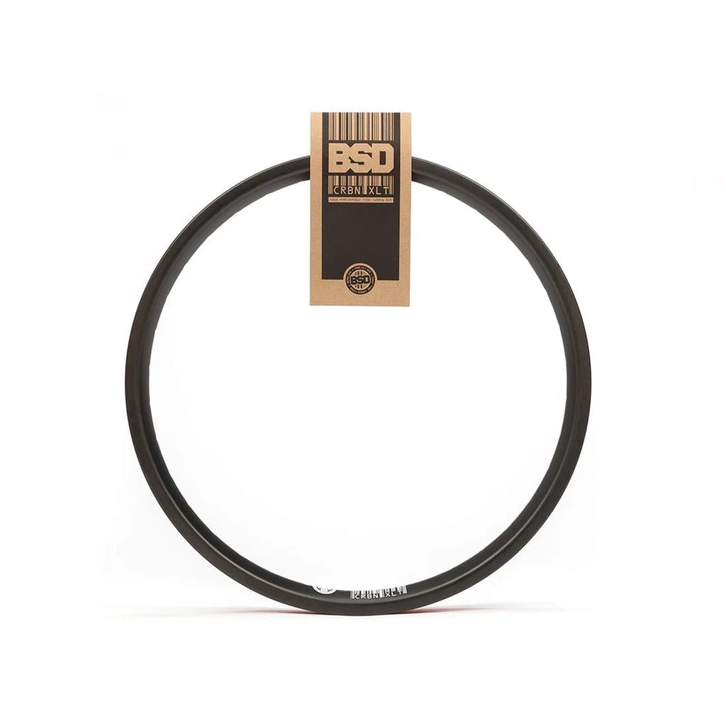 A black BSD Crbn-xlt 20 Inch Rim with a paper product tag hanging from the top.