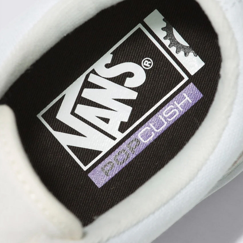A close up of Vans BMX Old Skool Pro Shoes - Marshmallow/White sneaker with a purple logo.