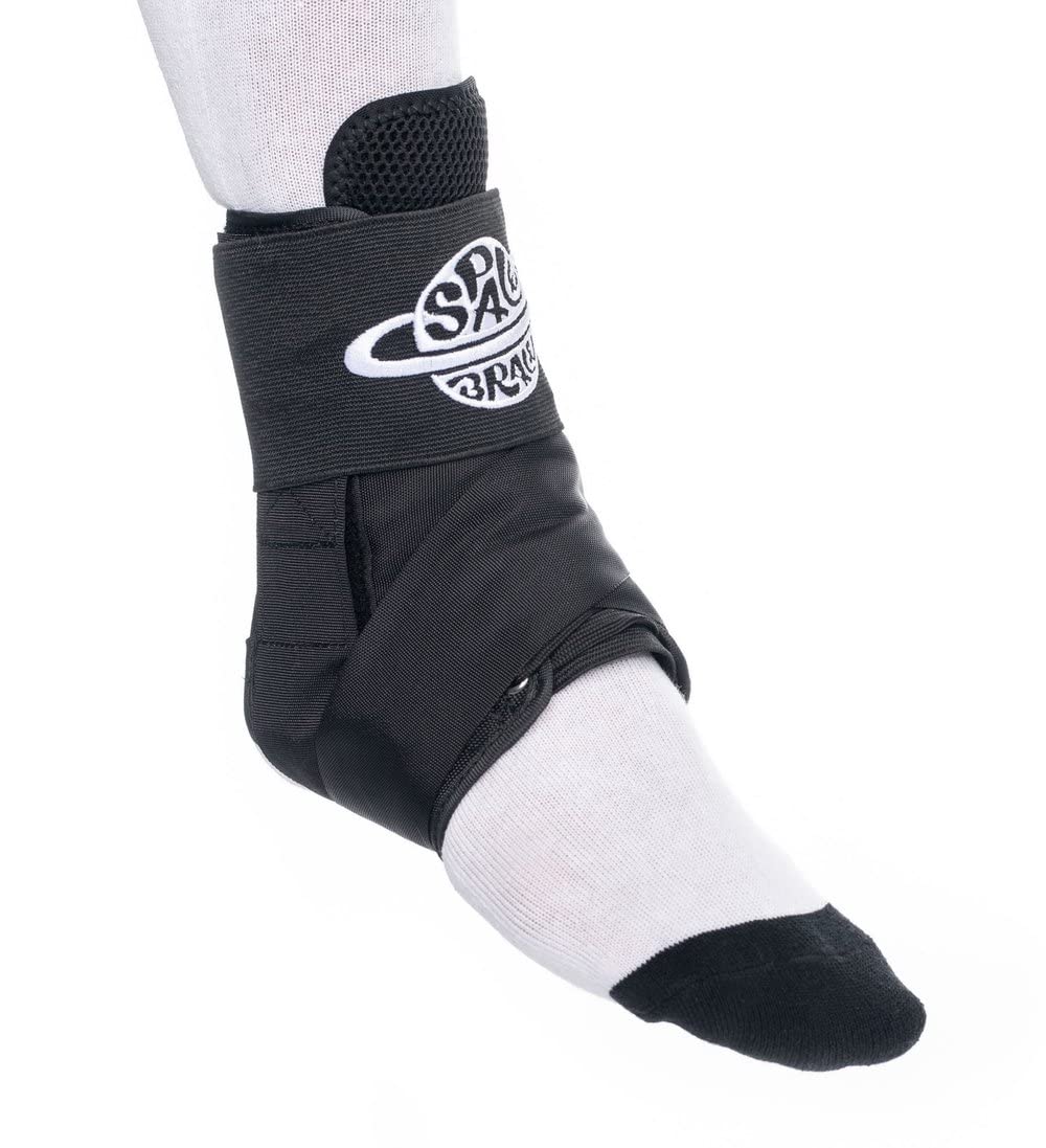 An ankle wrapped in a Space Brace 2.0 Ankle Brace (Single) featuring quick lace technology and a branded logo, over a white sock.
