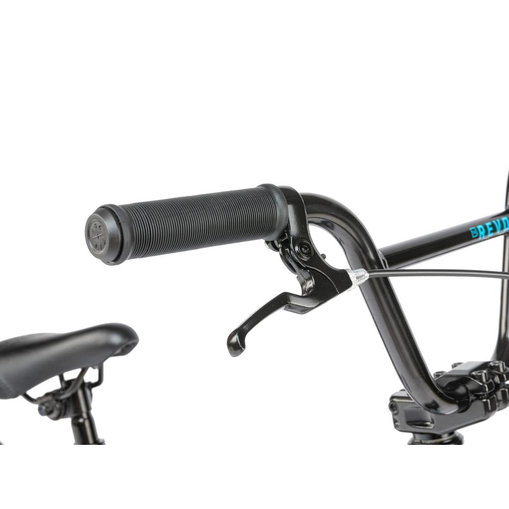 Close-up of the black handlebar, textured grip, brake lever, seat, and frame from the Radio Revo 16 Inch Bike—perfect details highlighting this ideal outdoor kids' bicycle.