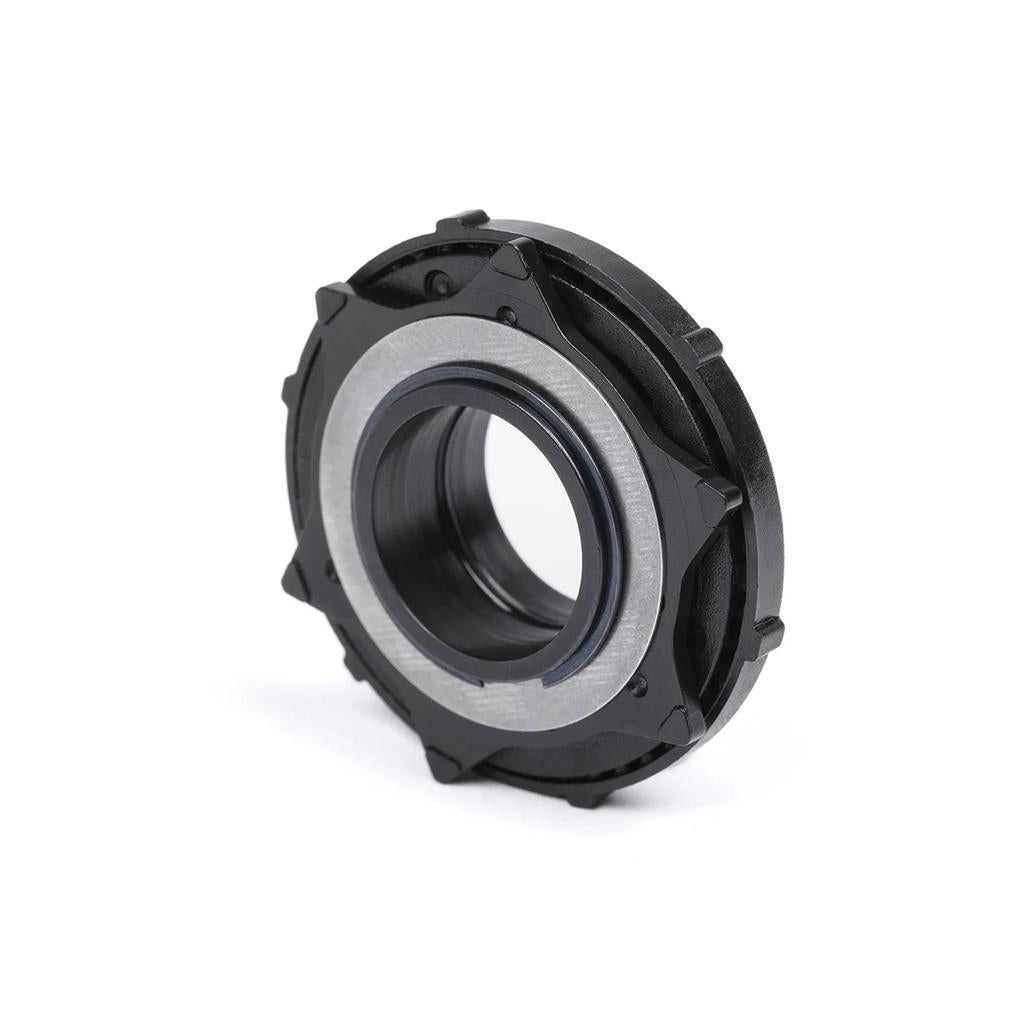 A close-up of the BSD Revolution Planetary Free Coaster V1.5 Clutch component with a black outer casing and metallic inner ring on a white background—ideal for your next clutch upgrade.