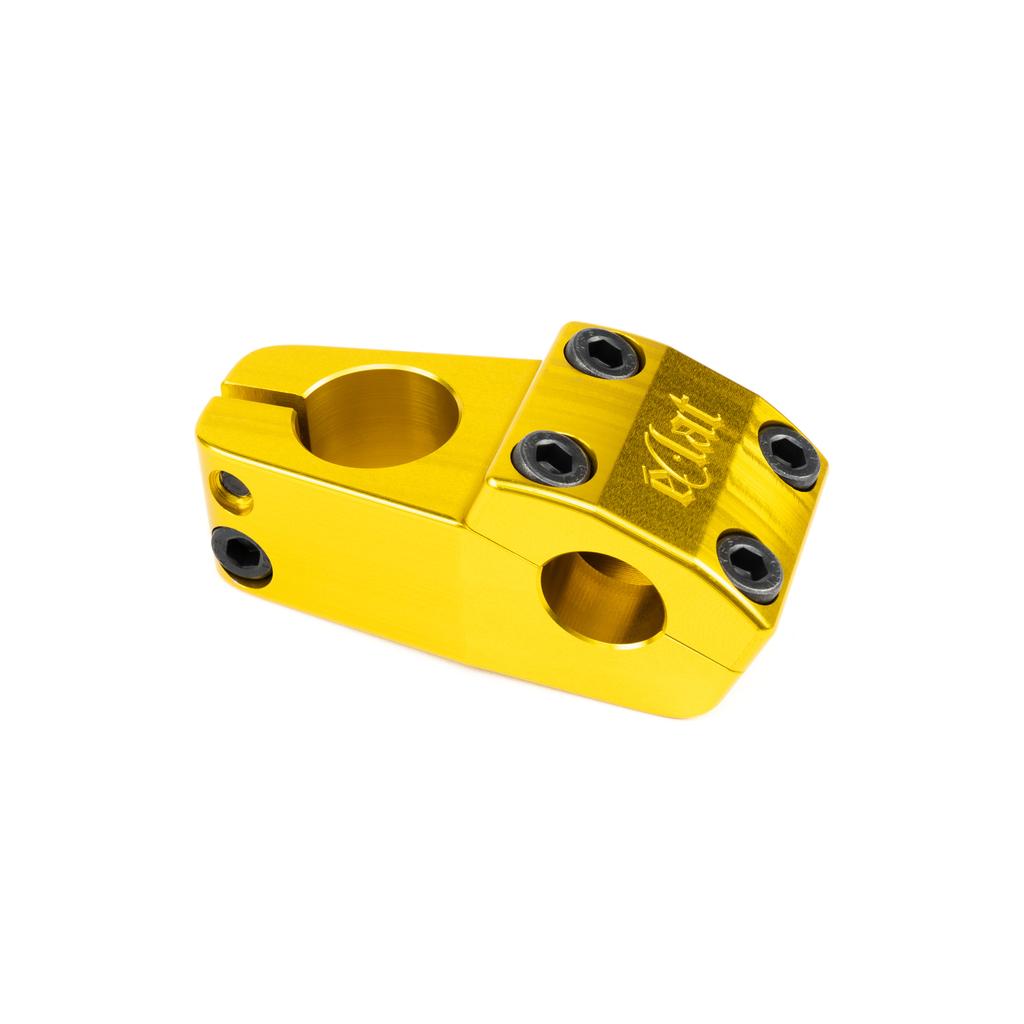 The Eclat 1023 Stem is a gold CNC-machined top load bike stem with four black front plate bolts and a single side bolt hole, displayed on a white background.