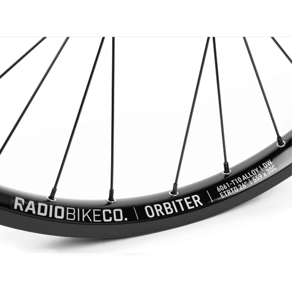 Close-up of a Radio Orbiter/Sonar 26 Inch Front Wheel bicycle wheel rim with spokes, labeled "radiobikeco. orbiter" on a white background, ideal for Street/Slopestyle riding.
