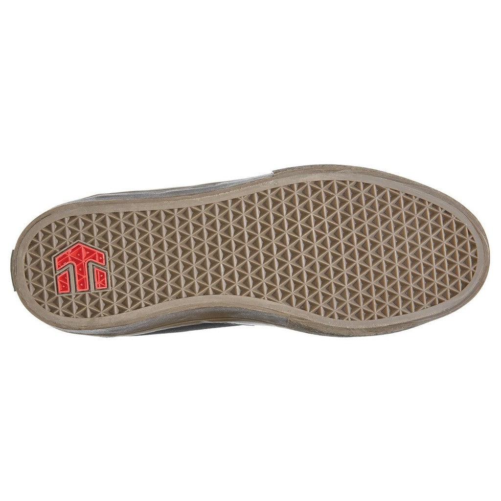 The Etnies Screw Vulc Mid X Rad Shoe with a red logo on the top.