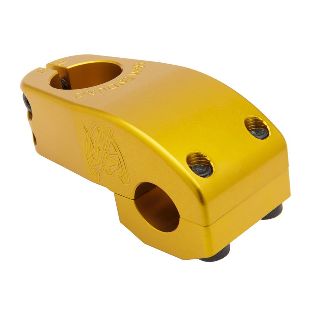 The S&M Enduro V2 Stem in gold anodized finish features a top load design with four top bolt holes and an engraved side logo.