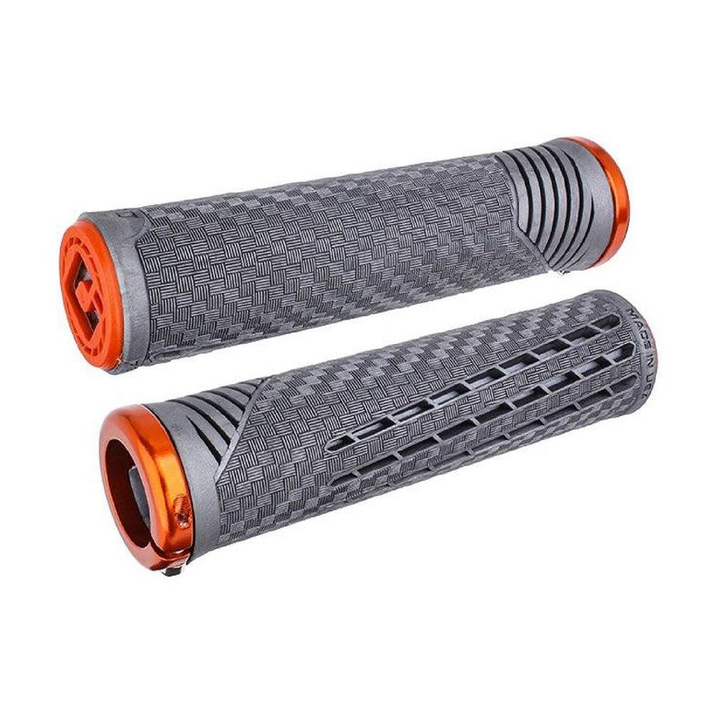 A pair of performance driven ODI CF Lock On Grips V2.1 in grey and orange on a white background.
