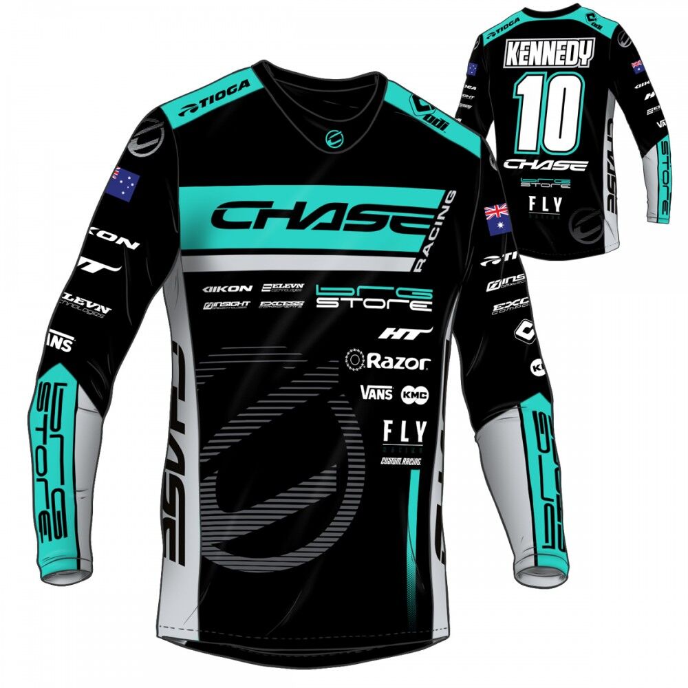 Chase Izaac Kennedy 2024 Team Replica Youth Jersey in black, teal, and white with "CHASE" logos, sponsor graphics, long sleeves, and "KENNEDY 10" on the back. Authentic youth BMX race jersey with bold Izaac Kennedy design.
