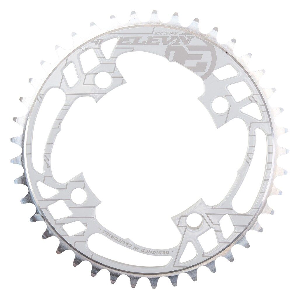 The Elevn Flow 4 Bolt 104 Chainring is a silver CNC race chainring with multiple cutouts and outer teeth, designed for bike cranksets with 104mm BCD compatibility.