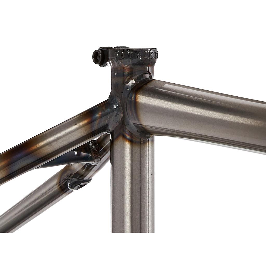 Close-up of a Fit Bike Co Mixtape V2 Frame featuring a 21" top tube, robust welds on the seat tube, and part of the rear triangle crafted from a high-quality Thermal X tubeset.