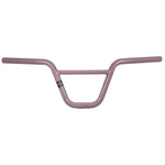 The Fit Bike Co AM Bars, designed for younger riders, feature a vibrant pink BMX handlebar with a sturdy crossbar and bold logo on the left side, perfectly complementing the AM 16 frame.