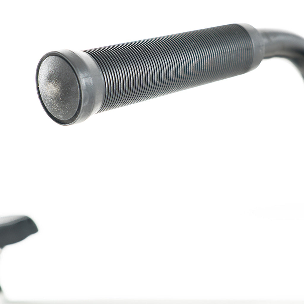 A close up of a bike handlebar on a white background featuring a Division Reark 20 Inch Bike.