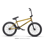 The Wethepeople Trust 20 Inch Freecoaster/Hybrid Bike features a matte gold and black frame, black handlebars and saddle, thick tires, and is shown in side profile on a white background—a sleek street-ready upgrade.