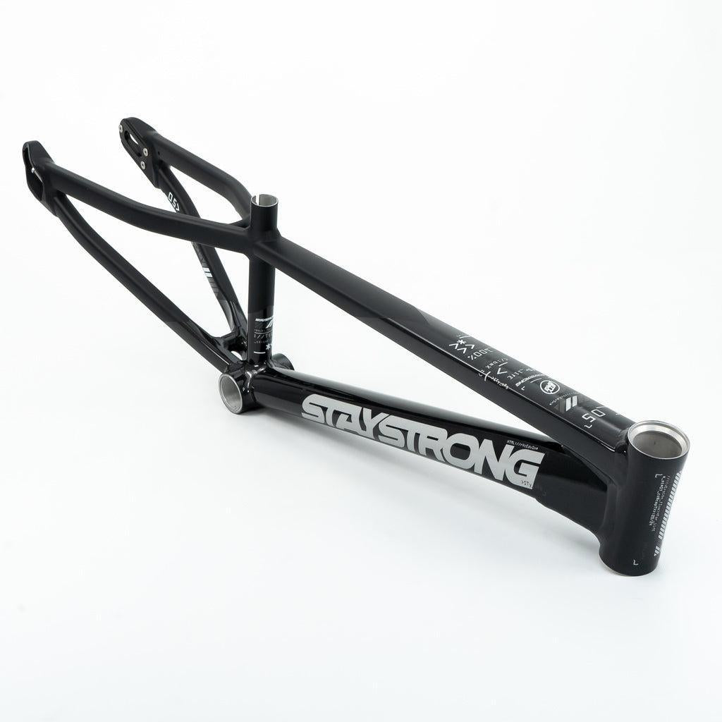 A black Staystrong V5 Disc Mini Frame with bold white "STAY STRONG" branding on the downtube, made from lightweight 6061 alloy tubing, is photographed against a plain white background.