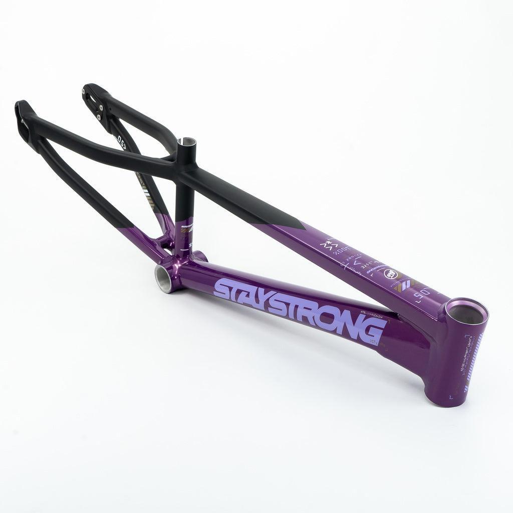 The Staystrong V5 Disc Mini Frame, a purple and black 6061 alloy race frame with "STAY STRONG" printed on the side, is displayed against a plain white background.