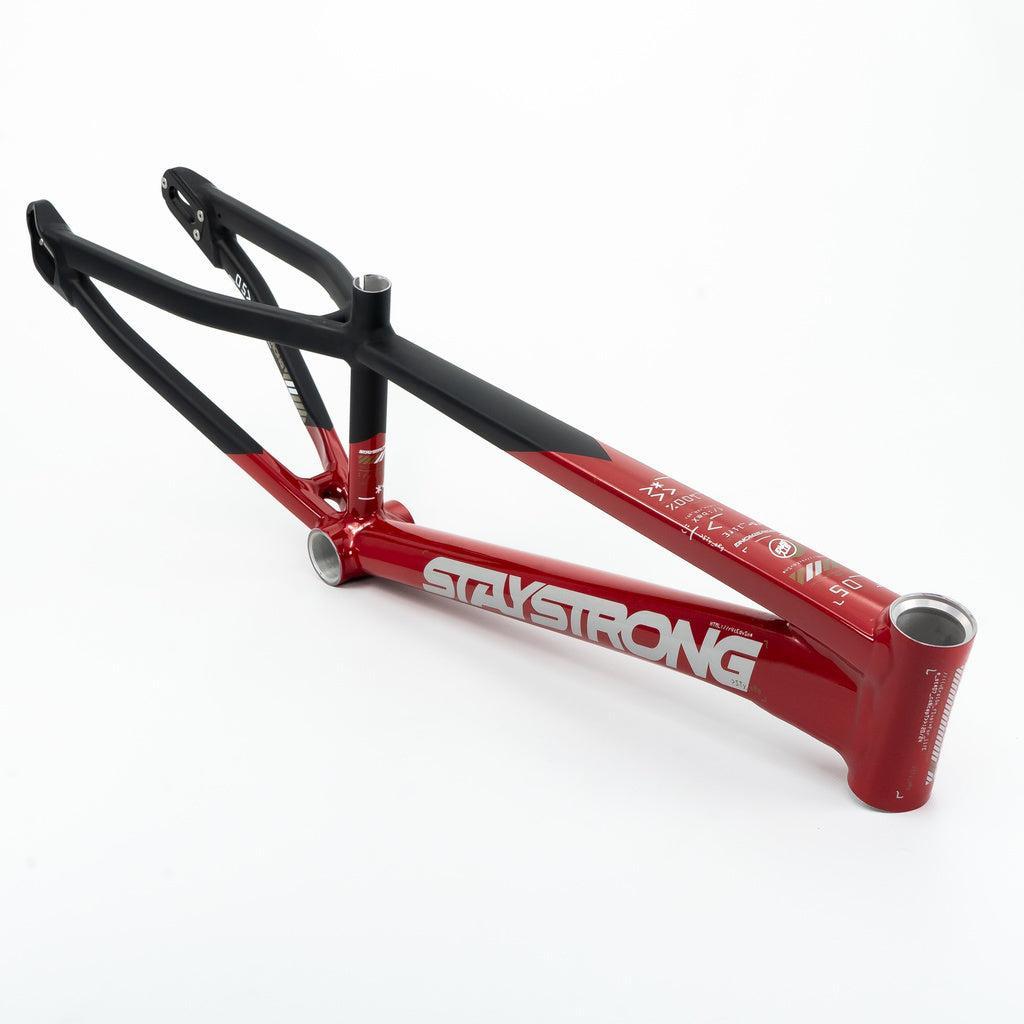 The Staystrong V5 Disc Mini Frame, an aluminum BMX race frame in red and black with disc brake compatibility, is displayed against a white background.