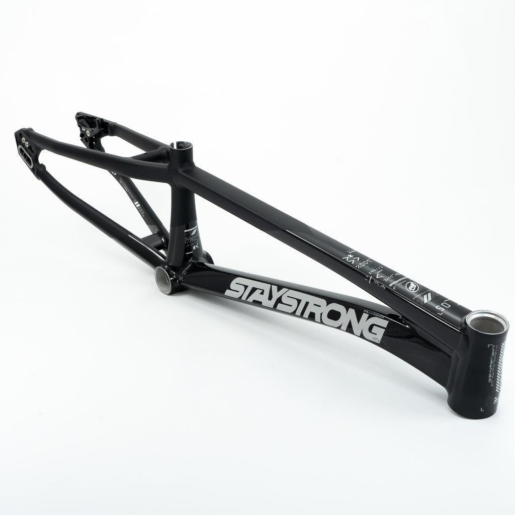 Staystrong V5 Disc Expert XL Cruiser Frame in black displayed on a white background, highlighting branding and aluminium race frame details.