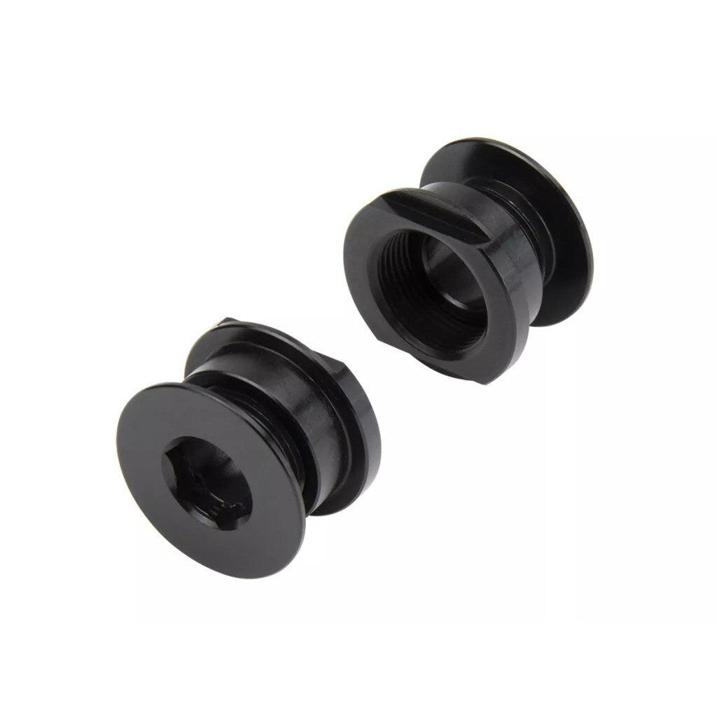 A pair of black Ikon 20-10mm Fork Adapters against a white background.