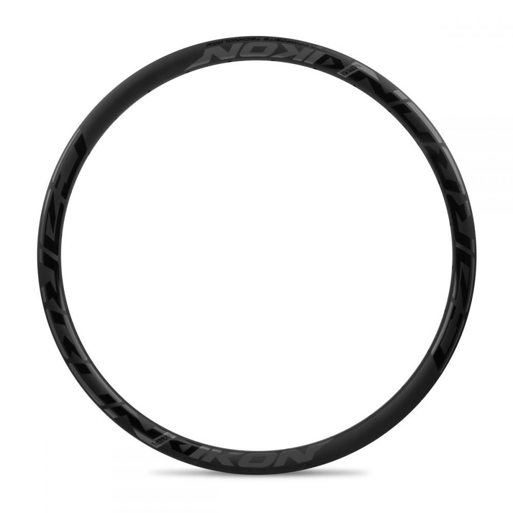 The IKON Carbon 28H Rim (20 x 1 1/8 - 1 3/8th) Non-Braking is a black circular Toray T700 carbon rim with subtle branding, sized at 451x22mm, tubeless compatible, and is shown against a white background.