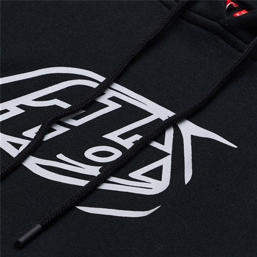 Stay cozy in the TLD 25.1 Badge Hoodie, featuring an abstract white geometric design and sleek black drawstrings—perfect for your winter wardrobe.