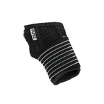 The Fuse Alpha Pro Wrist Guards (Pair), made from anti-bacterial neoprene with a striped elastic band and mesh panel, are black and shown on a plain white background.