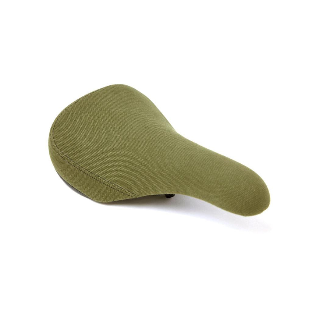 The S&M Stealth Pivotal Seat (Canvas) features a green canvas cover and sleek design for comfortable pedalling, displayed on a white background.