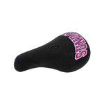 The Sunday Blockhead Pivotal Seat is a black bicycle seat with "SUNDAY" in purple text on top, offering a textured surface and classic saddle shape for ergonomic comfort.