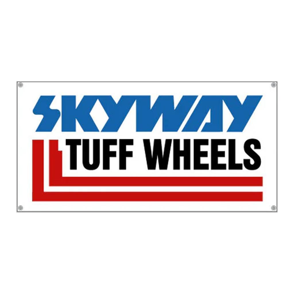 The Skyway Tuff Wheels Fork Style Banner is a rectangular, outdoor-grade waterproof vinyl banner with bold blue "SKYWAY" text above black and red "TUFF WHEELS," plus three red lines on a white background.