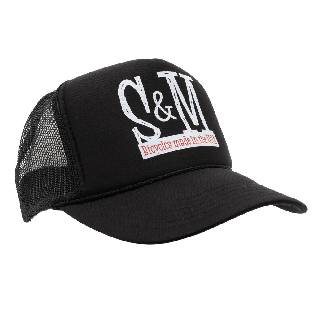 The S & M Scratch Tall Trucker Cap is a black high crown cap with a mesh back, featuring “S&M” in large white letters and “Bicycles made in the USA” in red text on the front.
