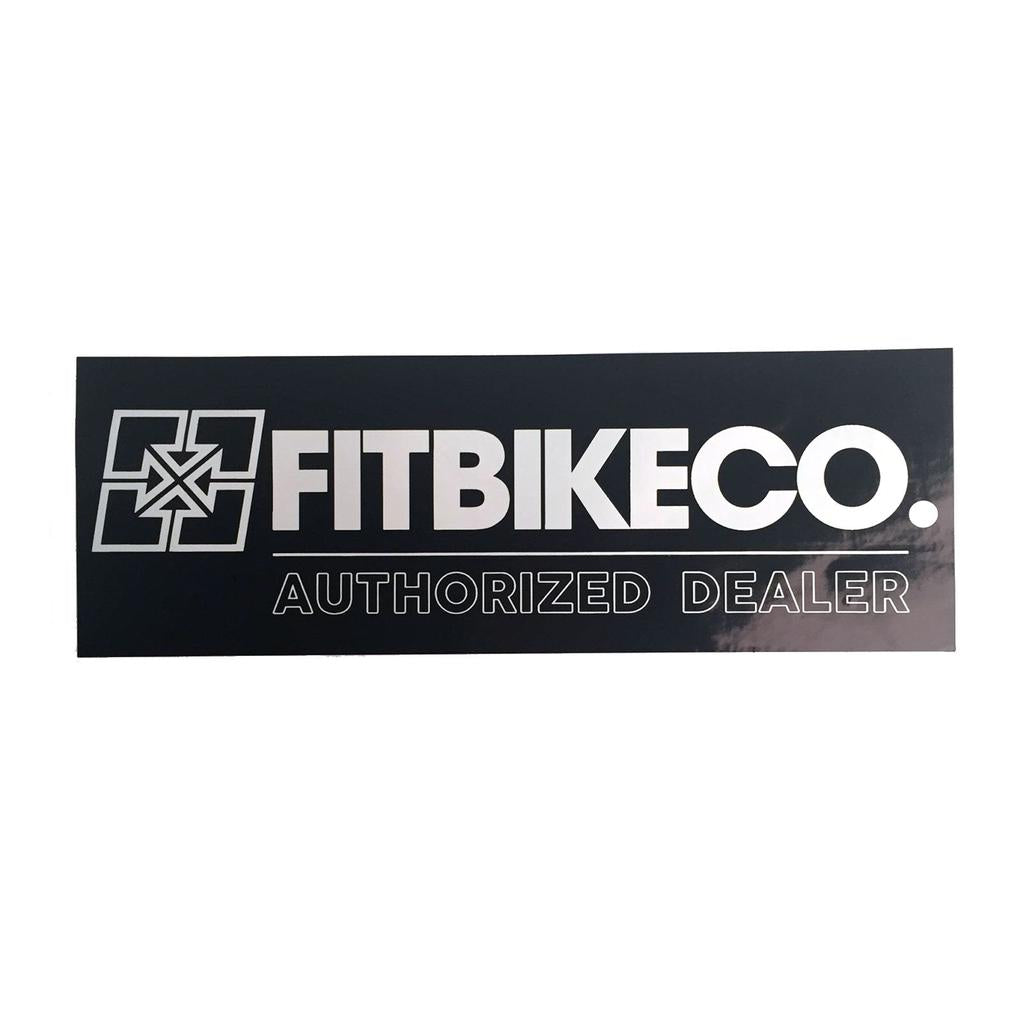 The Fit Bike Co Dealer Sticker is a black and silver garage sticker (200mm x 70mm) featuring the FitBikeCo. logo with "AUTHORIZED DEALER" text below.
