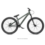 Side view of the Radio Griffin 24 Inch Dirt Jumper Bike in green, featuring flat handlebars, a front suspension fork, and thick tires, displayed on a white background.