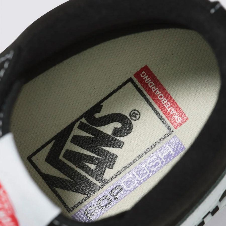 A close up of Vans Pro Skate Classics Sk8-Hi Shoes - Black/White sneakers.