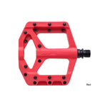 The HT Components Supreme C PA32A Pedals are red flat bike pedals featuring replaceable grip pins and a black spindle, designed for maximum grip and shown against a white background.