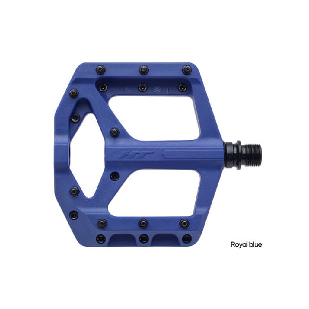 The HT Components Supreme C PA32A Pedals in royal blue feature multiple traction pins and a black spindle, shown side-on to highlight their grippy flat pedal profile.