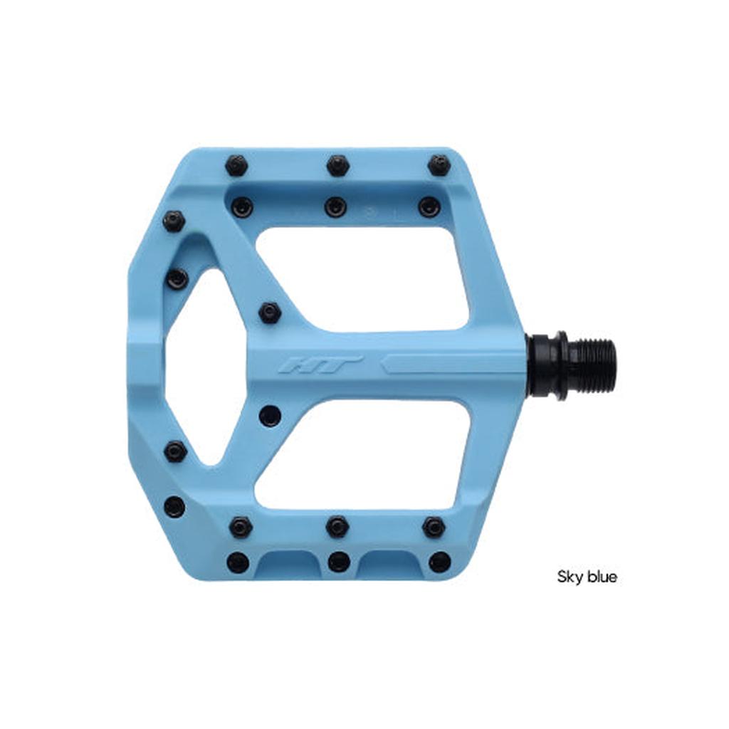 Sky blue HT Components Supreme C PA32A grippy pedals with replaceable pins and a black spindle, shown from the side.
